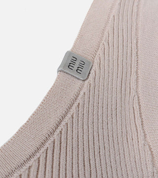 Details of Beige knitted top with logo - CALIENTE