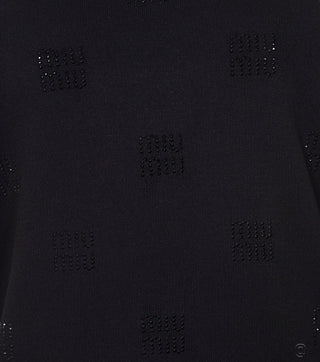 Close-up of Black knitted blouse with logo - CALIENTE