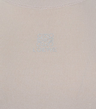 Detail of beige women knitted blouse - CALIENTE