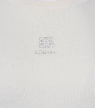 Close-up of women blouse with anagram cream - Caliente Fashion
