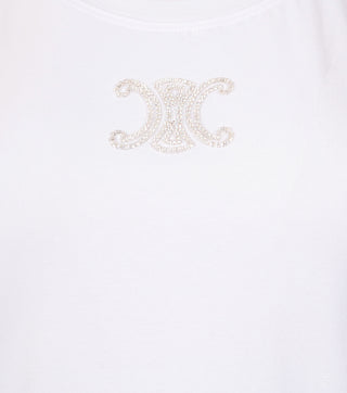 Close-up logo of white cotton t-shirt with logo - CALIENTE