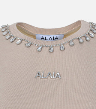 Close-up of Beige blouse with decorated collar - CALIENTE
