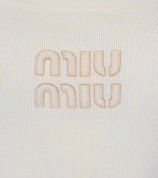 Logo of Cream knitted top with logo - CALIENTE