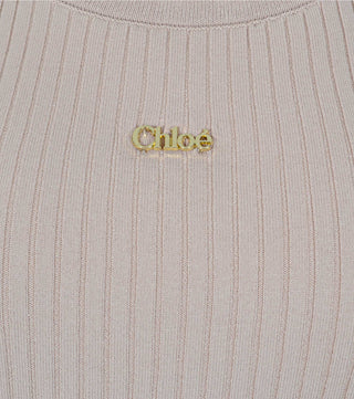 Metal logo from Beige knitted top with metal logo - CALIENTE