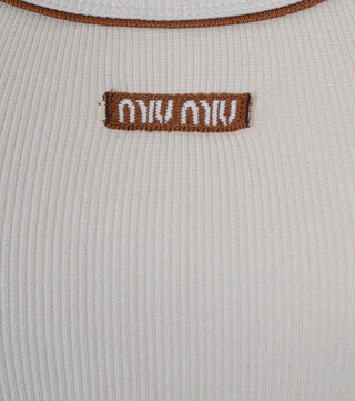 Close-up from Cream ribbed top with brown details - CALIENTE